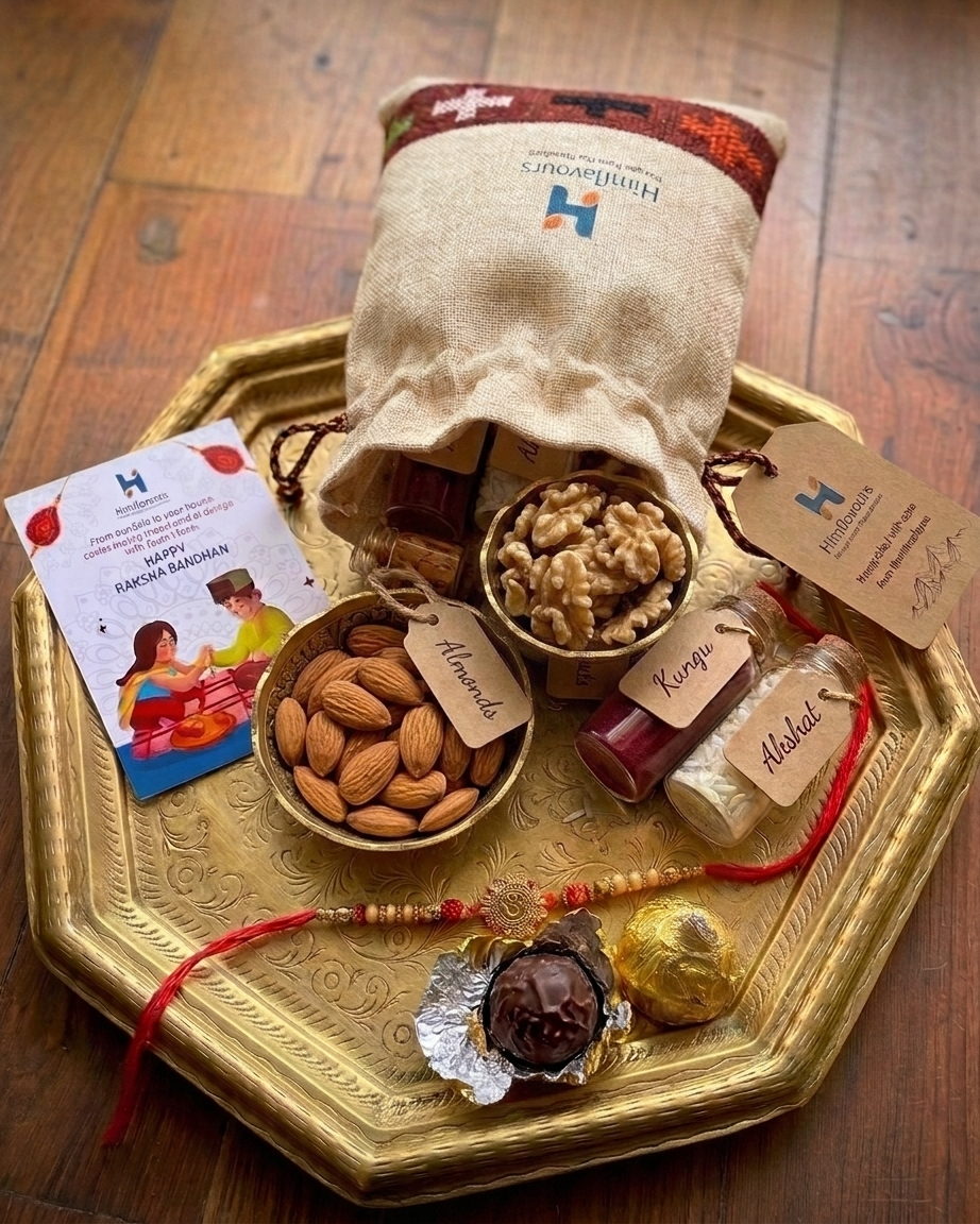 Rakhi gift potli with walnuts, rakhi, chocolates and akshat-kumkum